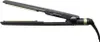 A black hair straightener with gold accents is shown against a white background. Voir les images du produit