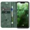 A green flip case for a smartphone, with cards and a banknote inserted. Produktbild-Vorschau