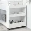 A white, three-tiered rolling storage cart filled with bathroom products and towels, placed next to a bathroom vanity. Náhľad obrázku produktu
