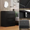 A collage of images showing a black dresser with four drawers, its features, and a bedroom setting. Náhled obrázku produktu