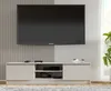 A TV stand with a TV mounted above it, in a modern living room setting. Voir les images du produit