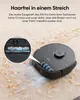 A robotic vacuum cleaner is shown on a carpeted floor with debris, with a close-up inset showing its brush mechanism. Blue lines indicate suction. Voir les images du produit