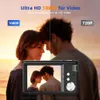 A couple is shown in the background, with a digital camera in the foreground displaying a similar image. Produktbild-Vorschau