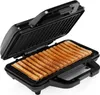An open waffle maker with waffle sticks inside. Podgląd zdjęcia produktu