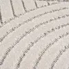 A close-up view of a textured rug with a geometric pattern. Podgląd zdjęcia produktu
