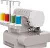 A close-up view of a sewing machine with spools of thread. Náhľad obrázku produktu