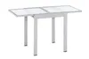 A table with a glass top and metal legs, shown from a slightly elevated side angle. Produktbild-Vorschau