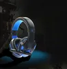 A gaming headset with blue LED lighting is displayed against a dark, textured background with a hint of a military-themed graphic. Produktbild-Vorschau