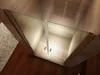 A top-down view of a shower door with glass panels and wooden framing. Produktbild-Vorschau