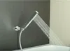 A modern square shower head spraying water into a bathtub. Náhľad obrázku produktu