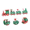A festive wooden Christmas train decoration with various carriages, including one with a bear, two with snowmen, and one with a Christmas tree. Náhled obrázku produktu