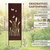 A decorative garden panel with a rust-look finish, featuring a design of wild grasses and butterflies, placed in a garden setting. Náhled obrázku produktu