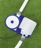 A pool filter pump sits on artificial grass. Voir les images du produit