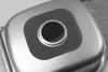 Close-up view of a stainless steel sink drain with a dark gasket. Produktbild-Vorschau