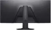 The back of a black Dell monitor on a black background. Voir les images du produit