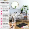 A living room scene with a dog on a couch and a dog crate. Produktbild-Vorschau