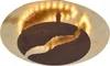 A close-up, overhead view of a decorative ceiling lamp with a gold leaf finish and a dark, textured center resembling a coffee bean. Produktbild-Vorschau
