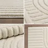 A collage of four close-up images showing the texture and design of a cream-colored rug with a subtle striped and curved pattern. Podgląd zdjęcia produktu