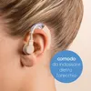 Close-up of a person's ear wearing a hearing aid, with a blue circular overlay containing text. Produktbild-Vorschau