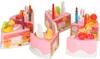 Several slices of a toy birthday cake are arranged on a white background. Podgląd zdjęcia produktu