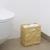 Papierbraune Box mit Toilettenpapier neben Toilette Produktbild-Vorschau