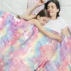A mother and daughter are sleeping together under a unicorn-themed blanket. Náhľad obrázku produktu
