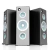 Three tall speakers are arranged in a row against a white background. Produktbild-Vorschau