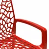 A close-up of a red chair armrest and part of the seat. Produktbild-Vorschau