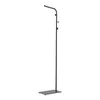A black floor lamp with a rectangular base and an adjustable arm. Podgląd zdjęcia produktu