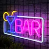 A neon sign shaped like a cocktail glass and the word 'BAR' is displayed against a brick wall background. Náhľad obrázku produktu