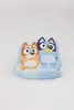 A plush toy of two cartoon dogs, Bluey and Bingo, on a white background. Podgląd zdjęcia produktu