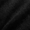 A close-up, textured view of a black fabric. Produktbild-Vorschau