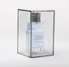 A bottle of perfume inside a clear plastic box. Podgląd zdjęcia produktu