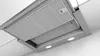A close-up, angled view of a built-in range hood, showing the underside with filters and lights. Voir les images du produit