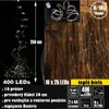 A product image showcasing a string of LED lights with a dark background and a wooden texture background. It includes text overlays with product specifications and features. Náhled obrázku produktu