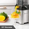 A close-up of a juicer making mango ice cream, with fresh mango and greens in the foreground. Produktbild-Vorschau