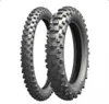 Two motorcycle tires are shown against a white background. Náhľad obrázku produktu