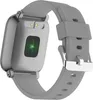 The back of a gray smartwatch with a green heart rate sensor. Produktbild-Vorschau