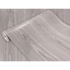 A roll of wood-grain patterned wallpaper is shown, with the roll partially unfurled. Produktbild-Vorschau