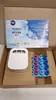 A Febreze 3Volution Smart Starter Kit with refill bottles is shown inside a cardboard box. Podgląd zdjęcia produktu
