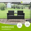 A black polyrattan garden bench with a table in the middle, placed on a wooden deck next to a pool, with an umbrella providing shade. Náhľad obrázku produktu