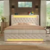 A modern bed with a tufted headboard and LED lighting. Produktbild-Vorschau