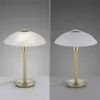 A split image showing a table lamp in two states: one lit and one unlit. Voir les images du produit