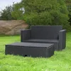 Outdoor furniture set on a grassy lawn with a large rock and trees in the background. Podgląd zdjęcia produktu