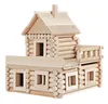A wooden log cabin toy house. Anteprima dell’immagine prodotto