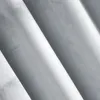 A close-up abstract view of folded fabric, likely a curtain, showing texture and light reflection. Náhľad obrázku produktu