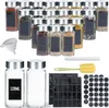 A collection of spice jars and accessories laid out on a white background. Voir les images du produit