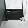 A close-up view of a modern black shower tray with a silver drain. Produktbild-Vorschau
