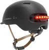 A black LIVALL C20 helmet with tan straps is shown against a white background. Anteprima dell’immagine prodotto