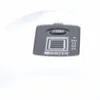A close-up of a gray electronic device with some text and a grid pattern. Podgląd zdjęcia produktu